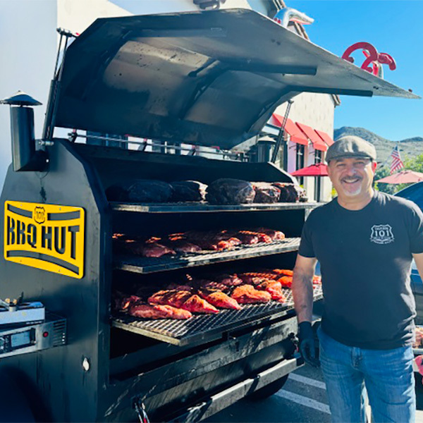 Our BBQ caterers near First Neighborhood, Westlake Village preparing barbecue food for special event.